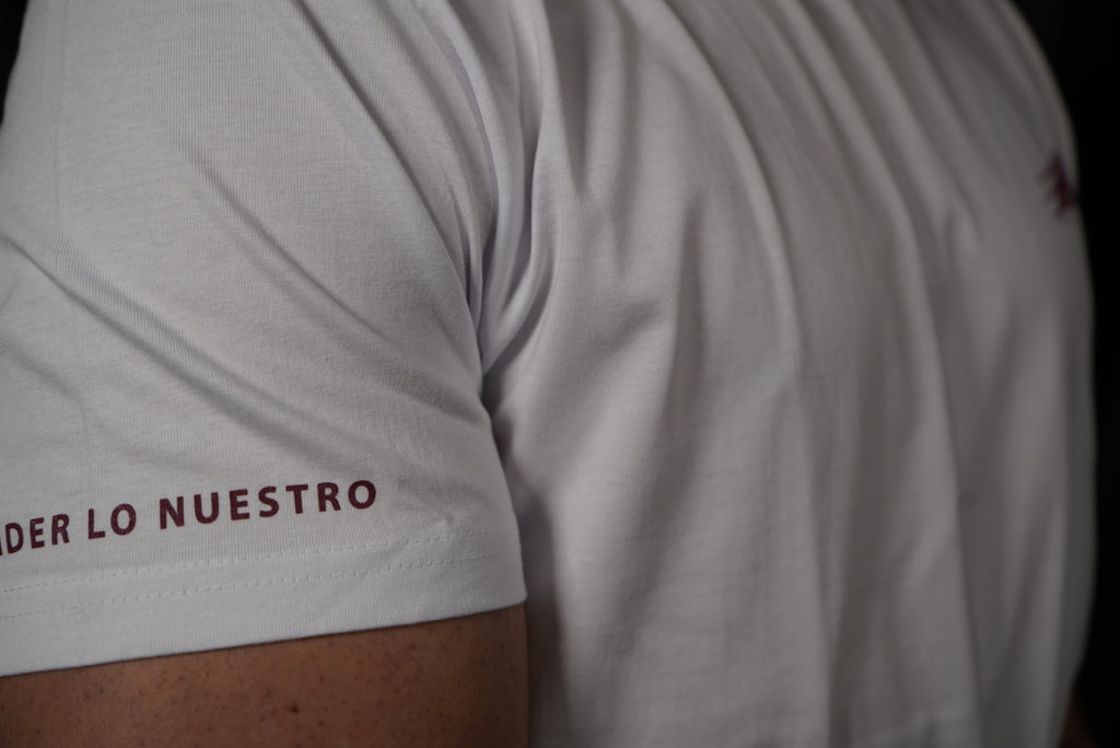 CAMISETA “DEFENDER LO NUESTRO” BLANCA
